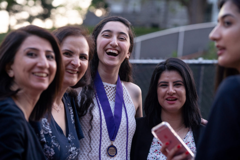 Students and families from James Madison University's Valley Scholars Program celebrate graduation.