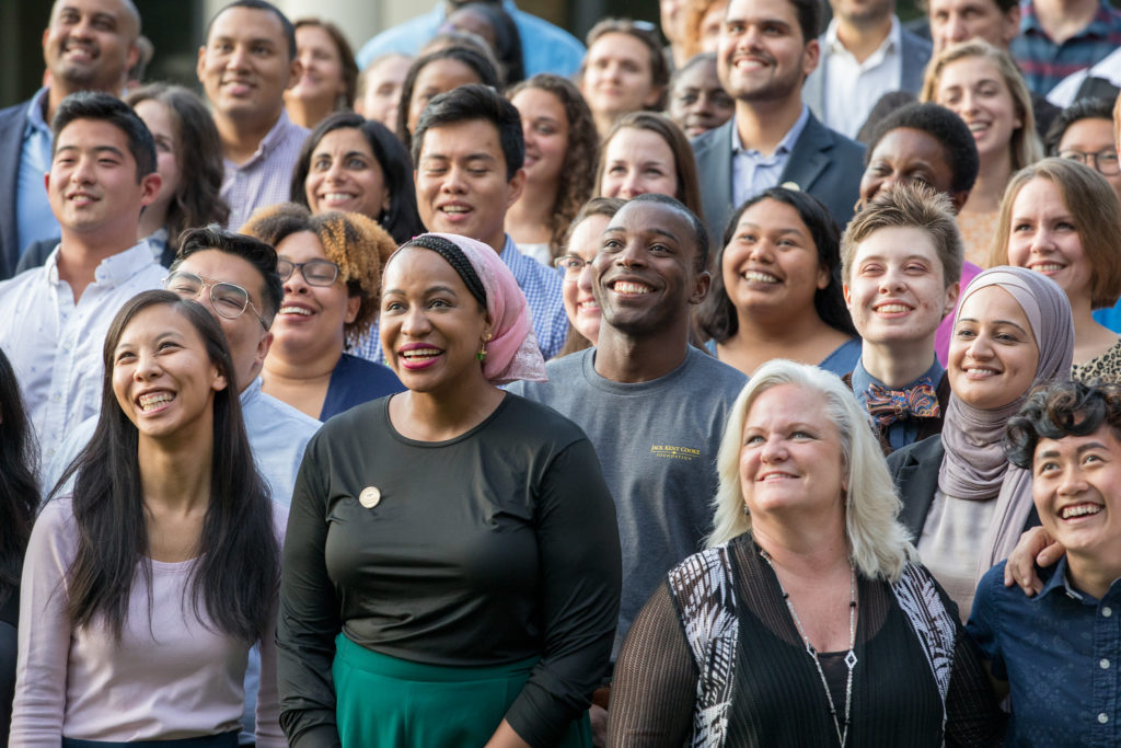 A crowd of Cooke Scholars look upwards at Scholars Weekend 2019.