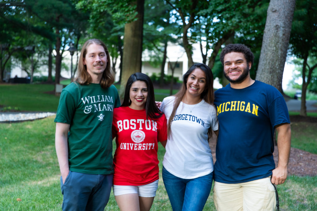 A group of people posing for the camera